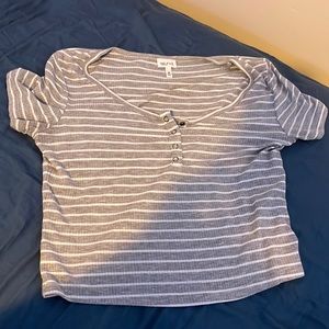Hey I am selling a medium Self E blouse that is grey and white.